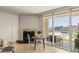 Inviting living area with stylish dining table and balcony access showcasing scenic views at 2877 Paradise Rd # 2502, Las Vegas, NV 89109