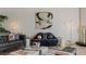 Living room showcasing modern furniture, unique artwork, and a stylish seating arrangement at 2877 Paradise Rd # 2502, Las Vegas, NV 89109
