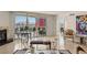 Bright, open living room boasts city views, marble floors, fireplace, and stylish seating at 2877 Paradise Rd # 2502, Las Vegas, NV 89109