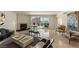 Sunlit living room with a fireplace, city views, and modern decor, perfect for relaxing or entertaining at 2877 Paradise Rd # 2502, Las Vegas, NV 89109