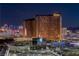 Vibrant night skyline featuring the Encore Hotel and the High Roller Observation Wheel, emphasizing entertainment at 2877 Paradise Rd # 2502, Las Vegas, NV 89109