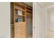 Well-organized walk-in closet with custom shelving at 2877 Paradise Rd # 2502, Las Vegas, NV 89109