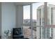 A well-lit corner showcases the city skyline through a large window, flanked by modern high-rise buildings at 2877 Paradise Rd # 2502, Las Vegas, NV 89109