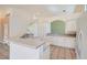 Bright kitchen boasts white cabinets, granite countertops, stainless appliances, and an open layout at 2889 Anteres St, Las Vegas, NV 89117