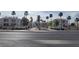 View of the Mar a Lago community entrance lined with palm trees at 3150 Soft Breezes Dr # 1008, Las Vegas, NV 89128