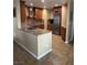 Updated kitchen featuring stone countertops and stainless steel appliances at 3150 Soft Breezes Dr # 1008, Las Vegas, NV 89128