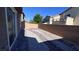 Backyard featuring a rock garden, privacy fence, and desert landscaping at 3339 Cromford Dr, North Las Vegas, NV 89081
