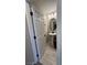 This is a cozy downstairs bathroom with hard surface floors and single pedestal sink at 3339 Cromford Dr, North Las Vegas, NV 89081