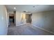 Carpeted upstairs bonus area offers flexible space with open layout, natural light, and easy access to other rooms at 3339 Cromford Dr, North Las Vegas, NV 89081