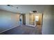 Spacious carpeted upstairs bonus area provides versatile living space with ample natural light and hallway access at 3339 Cromford Dr, North Las Vegas, NV 89081