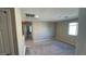 Upstairs bonus room with carpet, neutral walls, and a bright window creating a versatile space at 3339 Cromford Dr, North Las Vegas, NV 89081