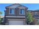Two story home featuring a two car garage at 3339 Cromford Dr, North Las Vegas, NV 89081