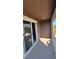 Private patio showcasing the sliding glass door entry and open-air space with railing at 3339 Cromford Dr, North Las Vegas, NV 89081