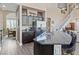 Gourmet kitchen with granite counters, stainless steel appliances, and an island with seating at 4212 Hawks Glide Ave, North Las Vegas, NV 89084