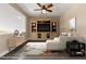 Cozy living room with built-in media center, ceiling fan and plush seating at 4212 Hawks Glide Ave, North Las Vegas, NV 89084