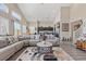 Cozy living room with large sectional sofa, and an open floorplan at 4212 Hawks Glide Ave, North Las Vegas, NV 89084