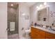 Bright bathroom featuring a glass shower, modern vanity, and granite countertop at 4525 Dean Martin Dr # 1103, Las Vegas, NV 89103