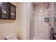 Bathroom featuring a glass-enclosed shower, tiled walls, and a modern vanity at 4525 Dean Martin Dr # 1103, Las Vegas, NV 89103