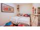 Cozy bedroom with twin beds, colorful accents, and unique decor at 4525 Dean Martin Dr # 1103, Las Vegas, NV 89103