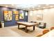 Inviting game room features a stylish pool table, modern lighting, and contemporary decor at 4525 Dean Martin Dr # 1103, Las Vegas, NV 89103