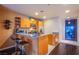 Charming kitchen with bar seating, stainless appliances, and modern finishes at 4525 Dean Martin Dr # 1103, Las Vegas, NV 89103