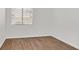 Bright bedroom with hardwood floors and a window with horizontal blinds at 731 Rising Star Dr, Henderson, NV 89014