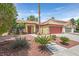 Charming single-story home featuring a well-manicured lawn and a classic red-tiled roof at 731 Rising Star Dr, Henderson, NV 89014