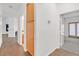 Bright hallway with storage cabinets and access to the living room and bedrooms at 731 Rising Star Dr, Henderson, NV 89014