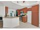 Functional kitchen with granite countertops, stainless steel appliances and tile floors at 731 Rising Star Dr, Henderson, NV 89014