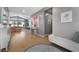 Spacious entryway with bright hardwood floors and a view to the living room at 8440 Footpath St, Las Vegas, NV 89166