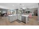 Spacious kitchen with a large island, stainless steel appliances, and open floor plan at 8440 Footpath St, Las Vegas, NV 89166
