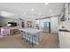 Open layout that seamlessly blends the kitchen with the living area, perfect for entertaining at 8440 Footpath St, Las Vegas, NV 89166