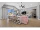 Bright and open living space offers a wall of built-ins and a seamless transition to the outdoor area at 8440 Footpath St, Las Vegas, NV 89166