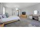 Large main bedroom offering a vanity area, ample space, and modern décor at 8440 Footpath St, Las Vegas, NV 89166