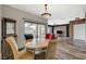 Dining space with hardwood floors connects the living area and includes stylish furnishings at 10809 Garden Mist Dr Dr # 2041, Las Vegas, NV 89135