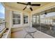 Inviting covered patio with views, seating, and a ceiling fan at 10809 Garden Mist Dr Dr # 2041, Las Vegas, NV 89135