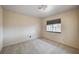 Bright bedroom with carpet, a window and neutral paint at 1580 Albino Dr, Henderson, NV 89002