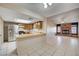 Kitchen with stainless steel appliances, light countertops, and wood cabinets, perfect for culinary enthusiasts at 1580 Albino Dr, Henderson, NV 89002