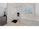 Bright bathroom featuring a separate shower and soaking tub near a window at 3024 Pismo Beach Dr, Las Vegas, NV 89128