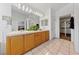 A bright bathroom features a double vanity and walk-in closet at 3024 Pismo Beach Dr, Las Vegas, NV 89128