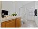 Bright bathroom featuring a shower, tile flooring, vanity, and mirrored medicine cabinet at 3024 Pismo Beach Dr, Las Vegas, NV 89128