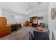 Bedroom featuring carpet, ceiling fan, and built in desk and shelving unit at 3024 Pismo Beach Dr, Las Vegas, NV 89128