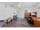 Bright bedroom with carpet, window, and built-in desk at 3024 Pismo Beach Dr, Las Vegas, NV 89128