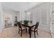 Dining room with tile floors and plantation shutters at 3024 Pismo Beach Dr, Las Vegas, NV 89128