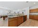 Spacious kitchen with granite counters, stainless steel dishwasher and hardwood cabinets at 3024 Pismo Beach Dr, Las Vegas, NV 89128