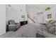 Spacious living room with soaring ceilings, staircase, and an inviting atmosphere with natural light at 3024 Pismo Beach Dr, Las Vegas, NV 89128