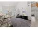 Open floor plan with high ceilings, dining area, and comfortable seating arrangement at 3024 Pismo Beach Dr, Las Vegas, NV 89128