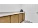 Laundry room with cabinets and counter at 328 Wild Plum Ln, Las Vegas, NV 89107