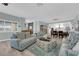 Open concept living room and dining area with lots of natural light at 328 Wild Plum Ln, Las Vegas, NV 89107