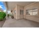 Covered patio with outdoor living area, ideal for relaxing or entertaining guests at 328 Wild Plum Ln, Las Vegas, NV 89107